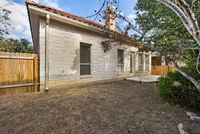 rear view of property with a patio area