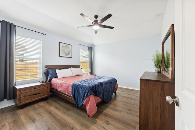 bedroom featuring ceiling fan and dark hardwood / wood-style flooring