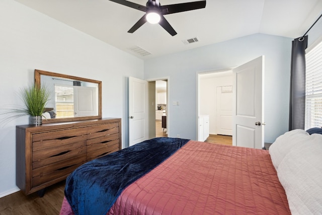 bedroom featuring ceiling fan, wood-type flooring, and lofted ceiling