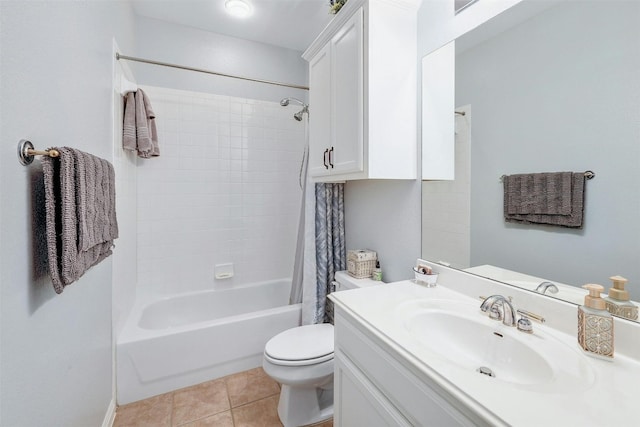 full bathroom featuring vanity, shower / tub combo, toilet, and tile patterned floors