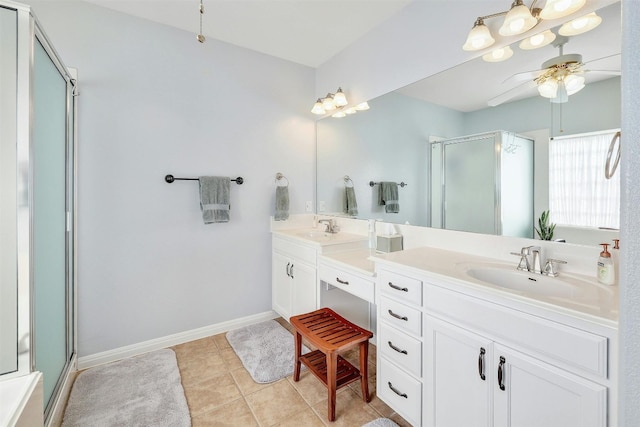 bathroom with vanity, walk in shower, tile patterned floors, and ceiling fan