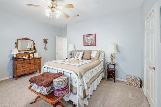 bedroom with ceiling fan and light colored carpet