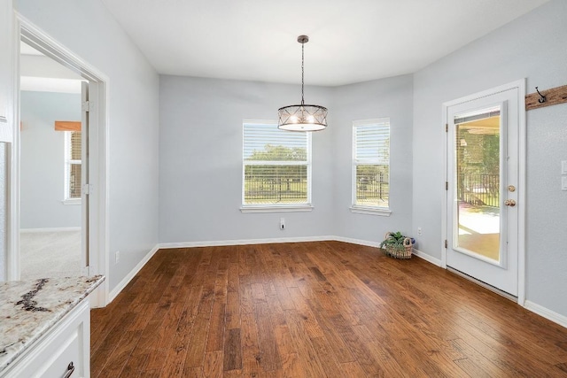 1900 County Road 245, Georgetown, TX 78633 - unfurnished dining area featuring dark wood finished floors and baseboards