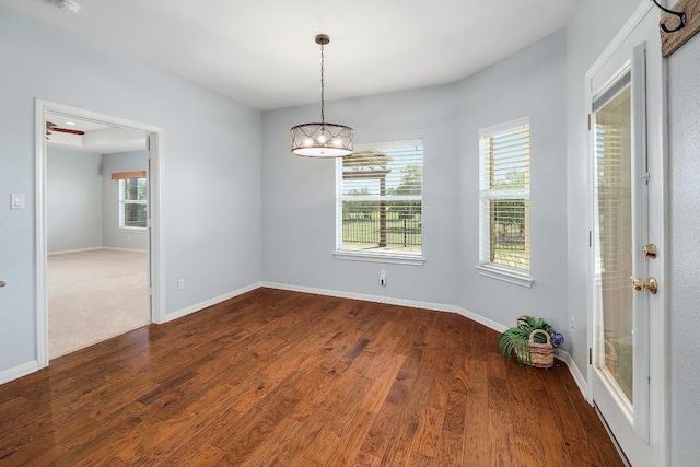 1900 County Road 245, Georgetown, TX 78633 - empty room with wood finished floors and a chandelier