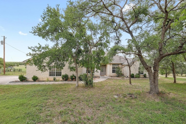 1900 County Road 245, Georgetown, TX 78633 - obstructed view of property featuring a front yard
