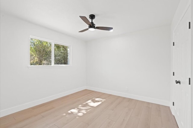 unfurnished room with ceiling fan and light hardwood / wood-style floors