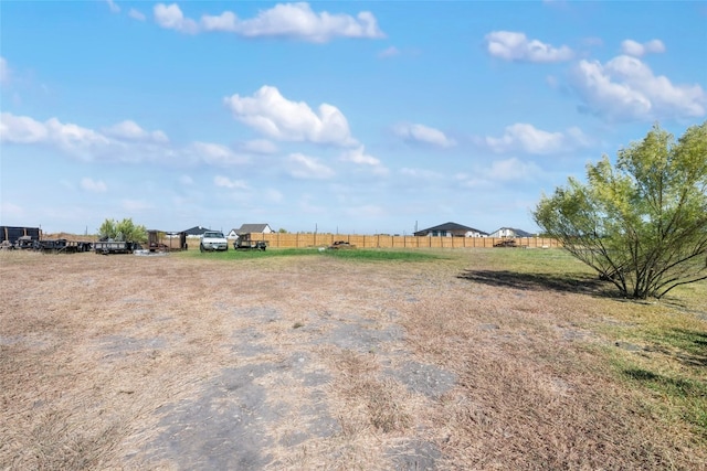 view of yard with a rural view