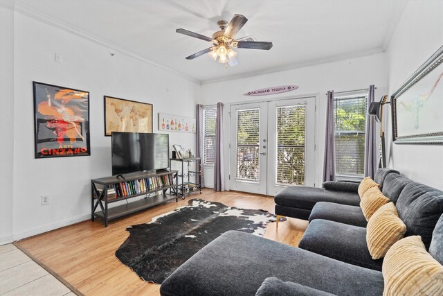 living room featuring french doors, ornamental molding, hardwood / wood-style flooring, and ceiling fan