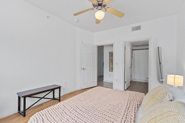 bedroom featuring ceiling fan and light hardwood / wood-style flooring