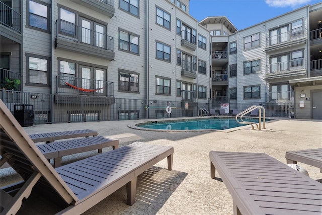 view of pool featuring a patio area