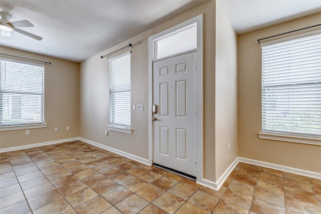 1201 Grove Blvd Unit 2403, Austin, TX 78741 - entryway featuring baseboards, a wealth of natural light, and ceiling fan