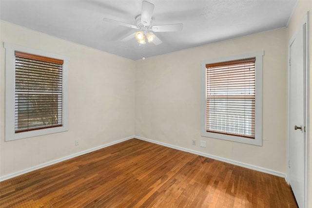 unfurnished room with hardwood / wood-style floors and ceiling fan