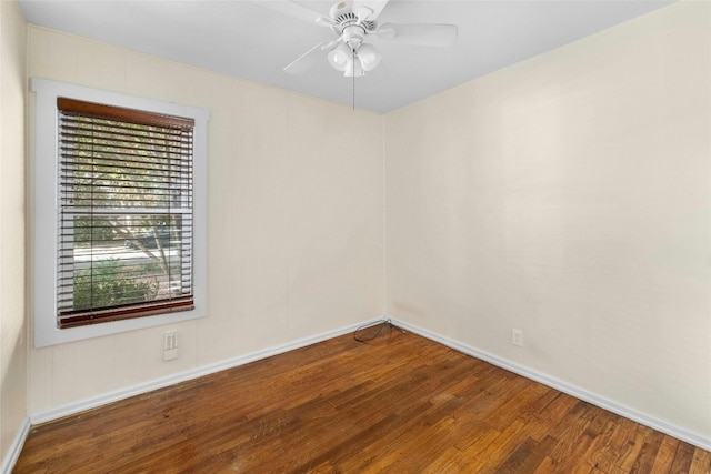 spare room featuring ceiling fan and wood-type flooring