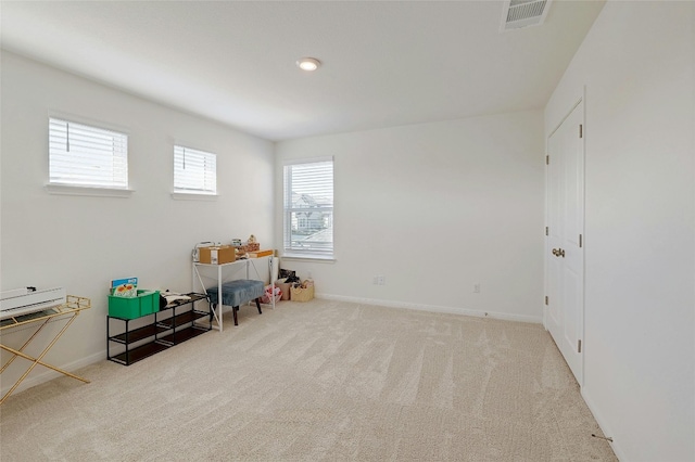 playroom featuring light carpet