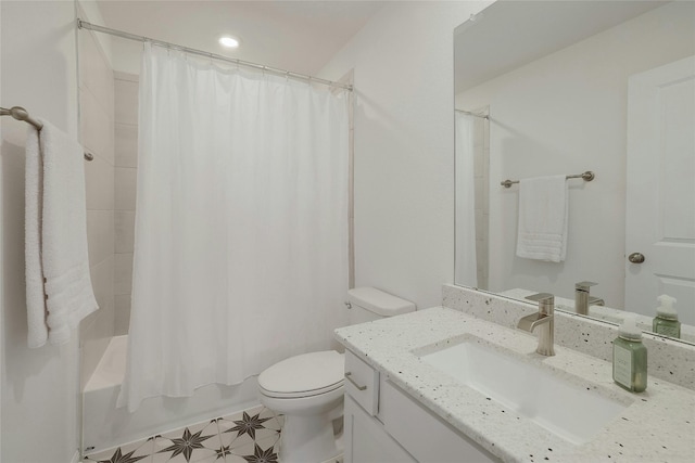 full bathroom with vanity, toilet, and shower / bath combo with shower curtain