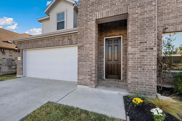 entrance to property featuring a garage