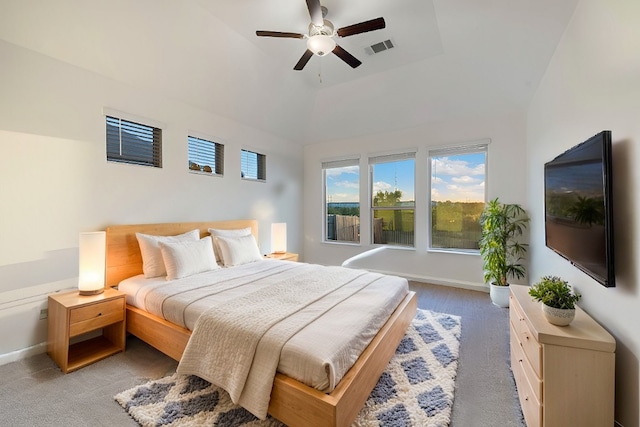 bedroom with carpet, vaulted ceiling, and ceiling fan