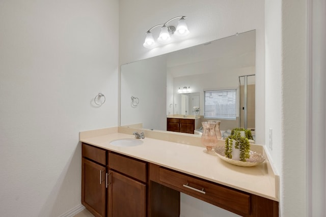 bathroom with vanity and walk in shower