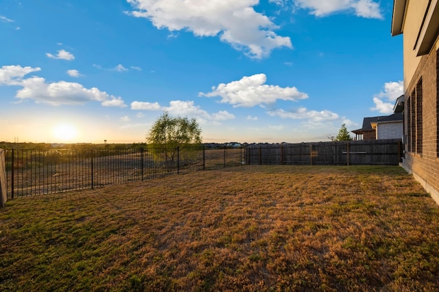 view of yard with a rural view