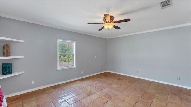 unfurnished room with a ceiling fan, crown molding, baseboards, and tile patterned flooring