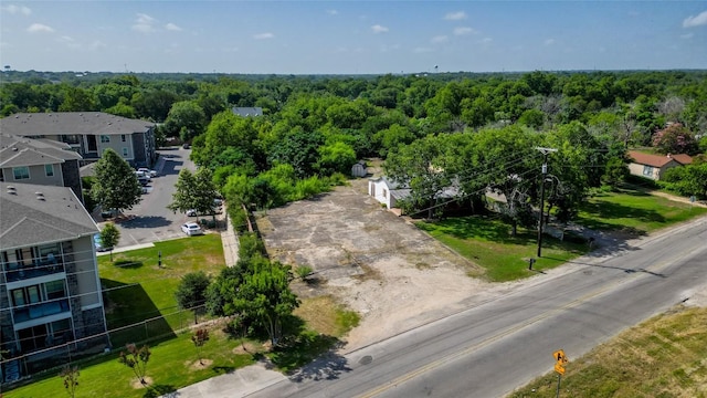 drone / aerial view of a heavily wooded area