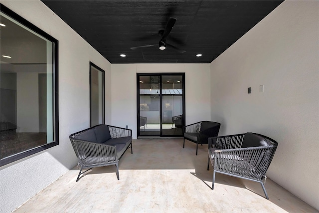 view of patio featuring ceiling fan