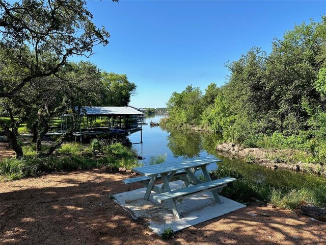 dock area featuring a water view