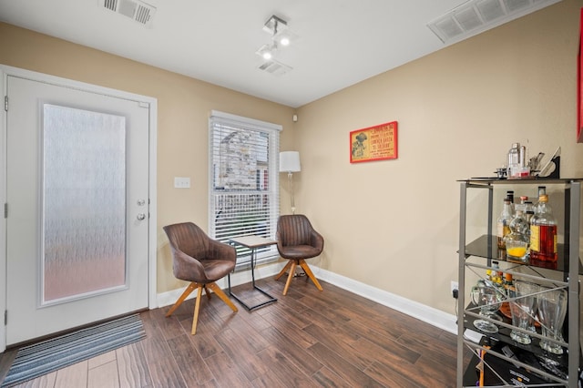 living area with dark wood-type flooring