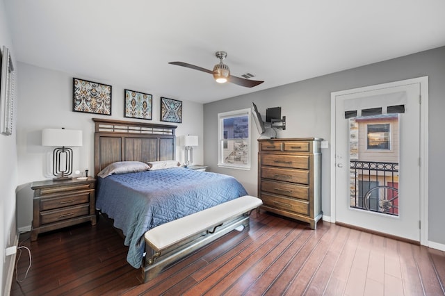 bedroom with dark wood-type flooring and ceiling fan