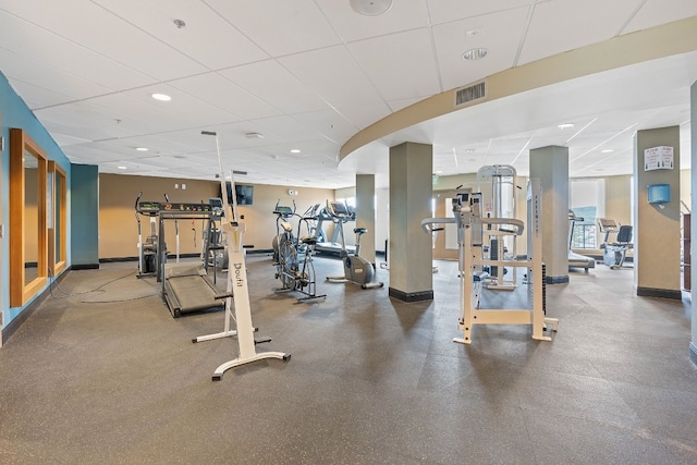 gym featuring a paneled ceiling