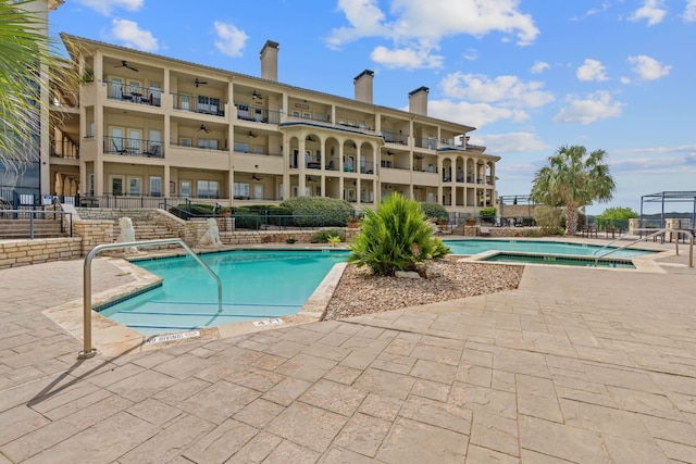 3404 American Dr Unit 2108, Lago Vista, TX 78645 - community pool featuring a patio and ceiling fan