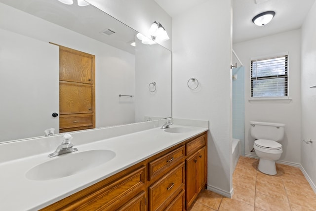 full bathroom with toilet, bathing tub / shower combination, vanity, and tile patterned floors