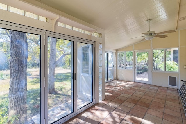 doorway to outside with vaulted ceiling, ceiling fan, and plenty of natural light