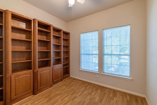 unfurnished room with light hardwood / wood-style floors and ceiling fan