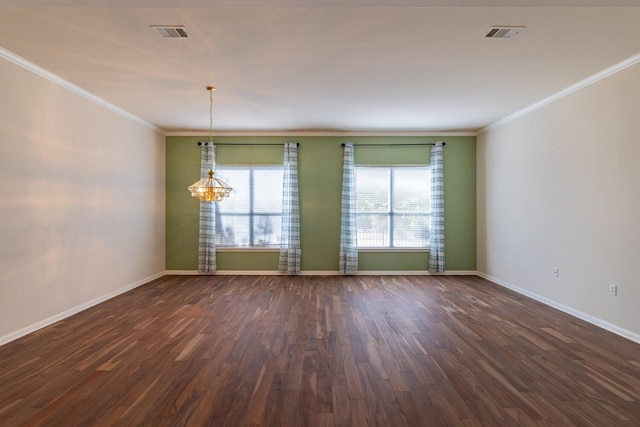 unfurnished room featuring ornamental molding, an inviting chandelier, and dark hardwood / wood-style flooring