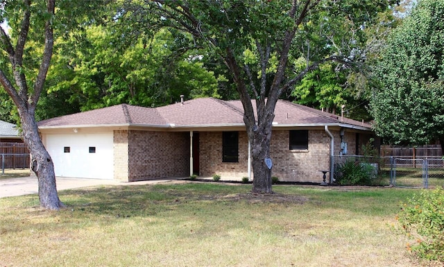 single story home with fence, an attached garage, a shingled roof, a front lawn, and brick siding