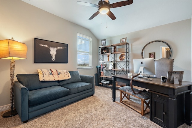 office area featuring ceiling fan, light colored carpet, and vaulted ceiling