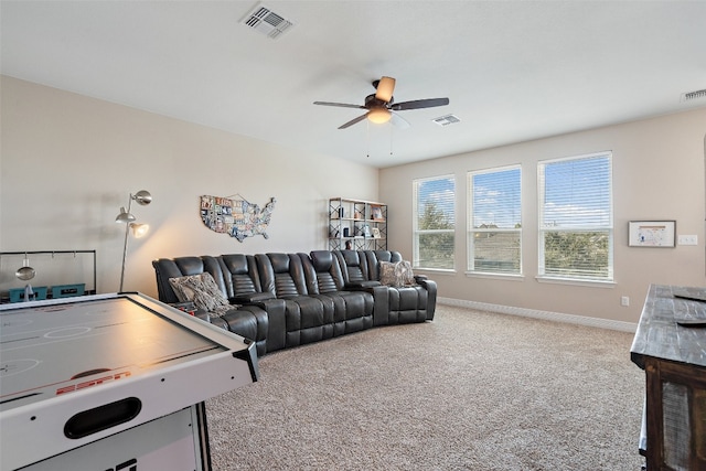 game room with carpet flooring and ceiling fan