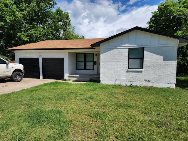 ranch-style house with a front lawn and a garage