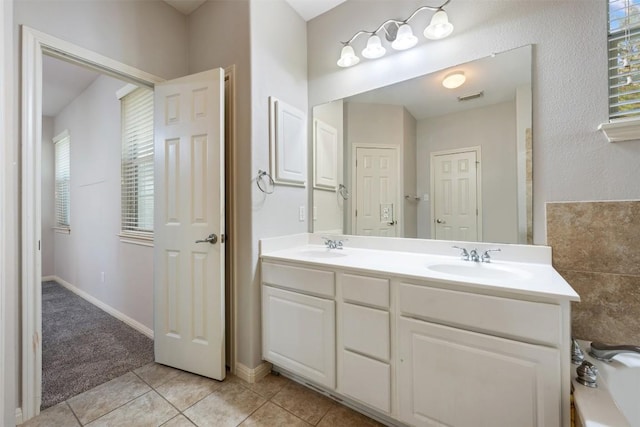 bathroom featuring vanity and tile patterned flooring