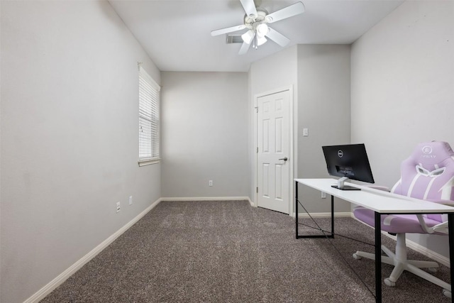 home office featuring dark carpet and ceiling fan