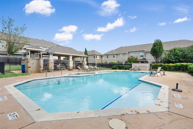 view of swimming pool featuring a patio