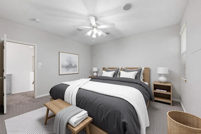 bedroom featuring ceiling fan and dark colored carpet