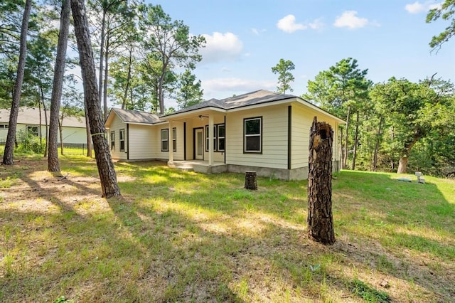 view of front of home with a front lawn