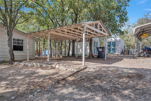 exterior space with a detached carport