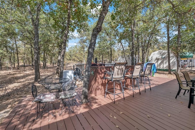 320 Pope Bnd S, Cedar Creek, TX 78612 - deck featuring a shed and outdoor dining space