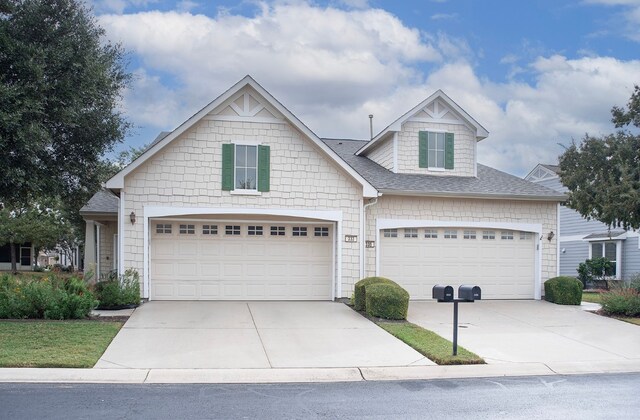 craftsman inspired home featuring a garage