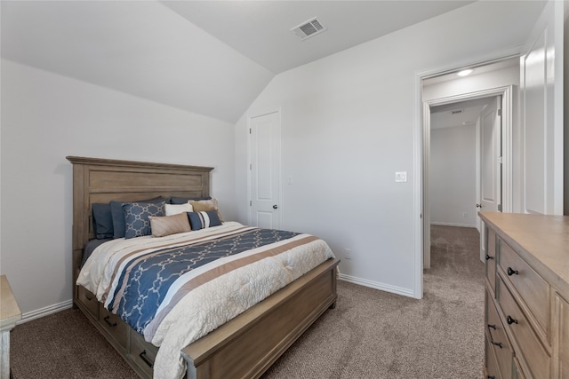 bedroom with light carpet and lofted ceiling