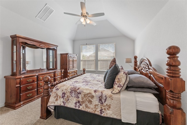 bedroom with light carpet, vaulted ceiling, and ceiling fan