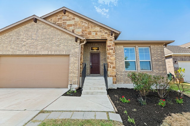 view of front of home with a garage